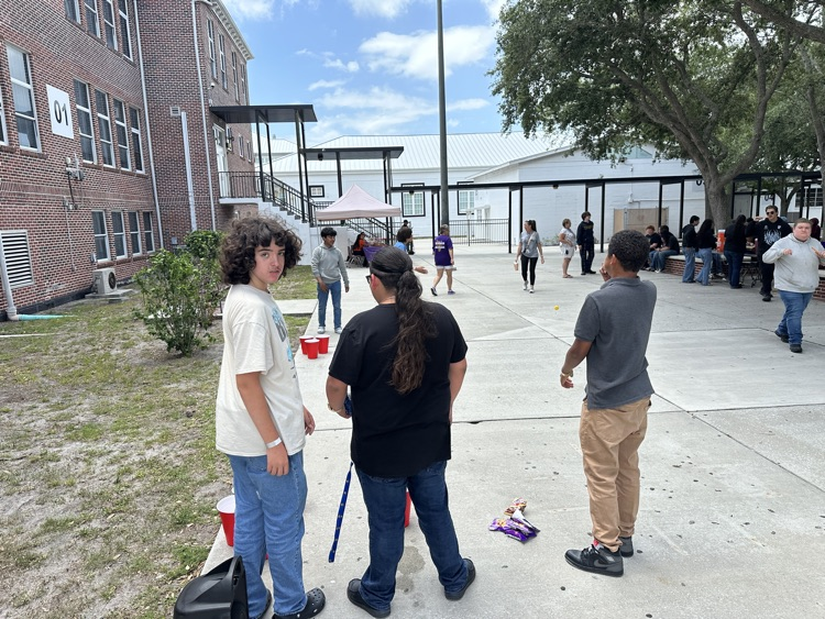 students playing in courtyard