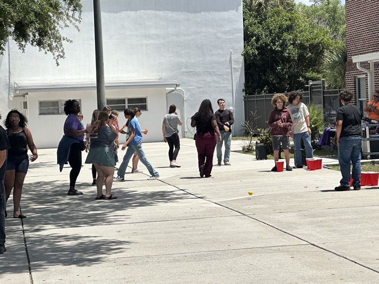 students playing in courtyard