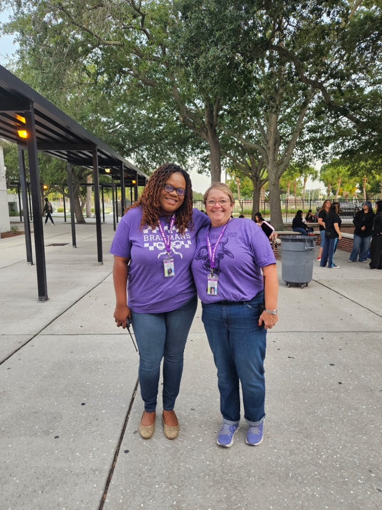 admin team outside in courtyard 