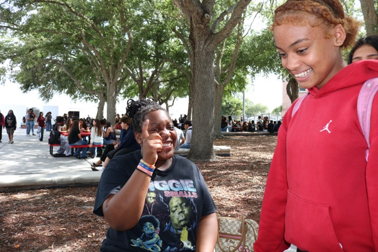 two students in school courtyard