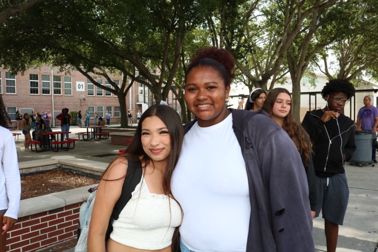two students in school courtyard