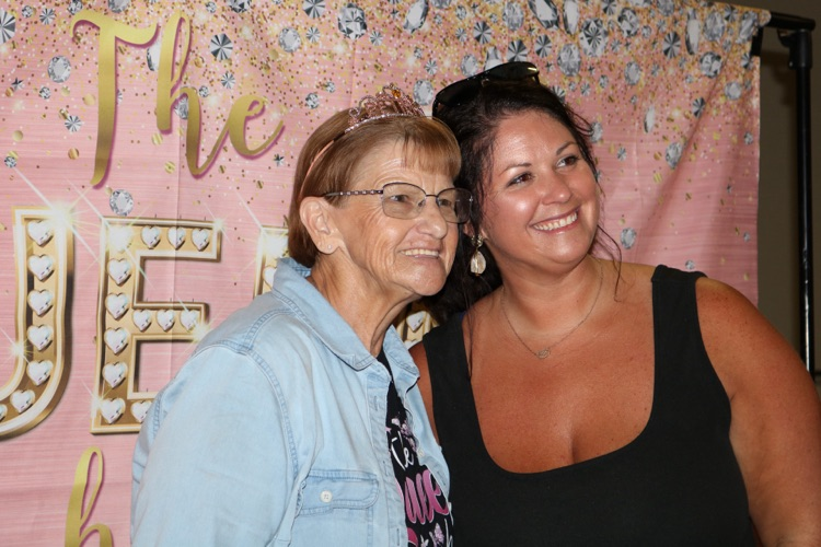two school members at retirement party 