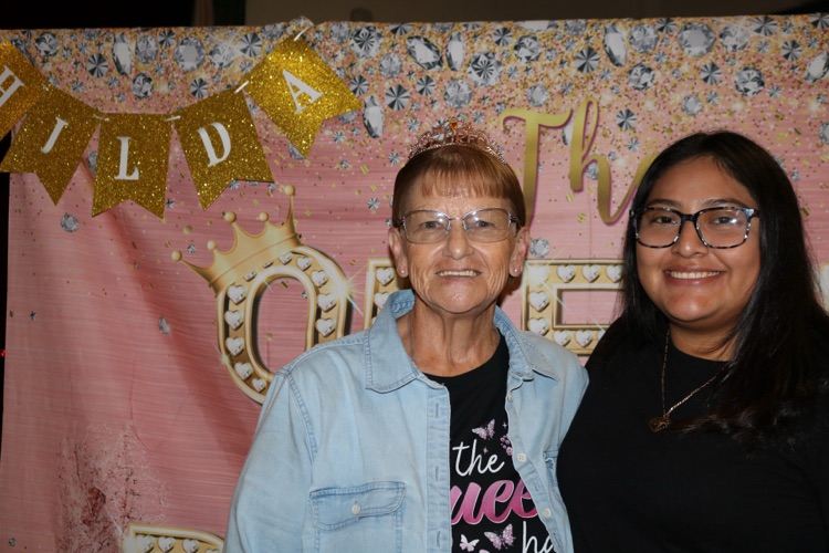 two school members at retirement party 