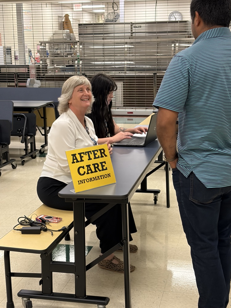 teacher explaining aftercare at open house
