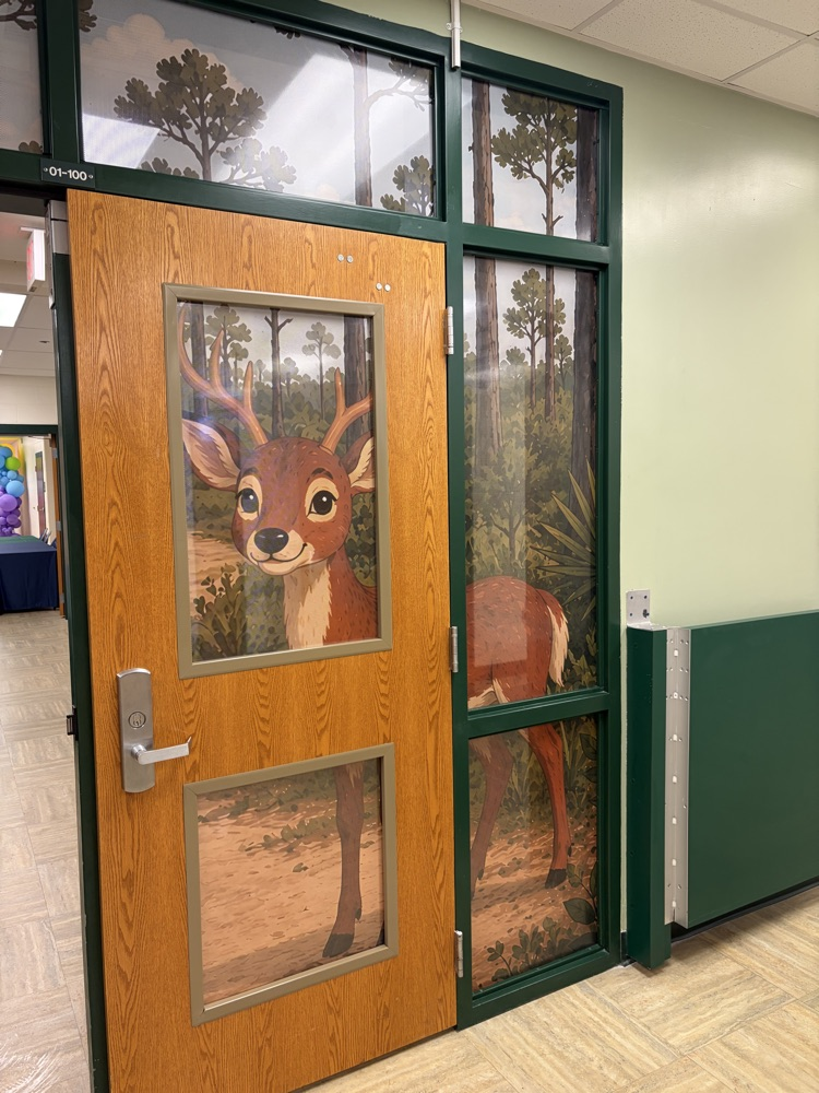 door with a deer on it