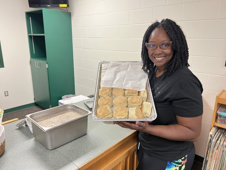 teacher showing biscuit and gravy
