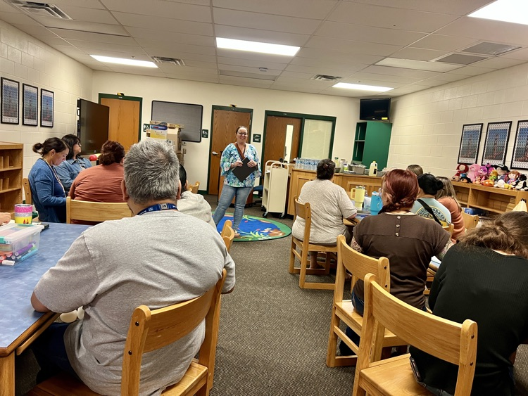 staff meeting in media center