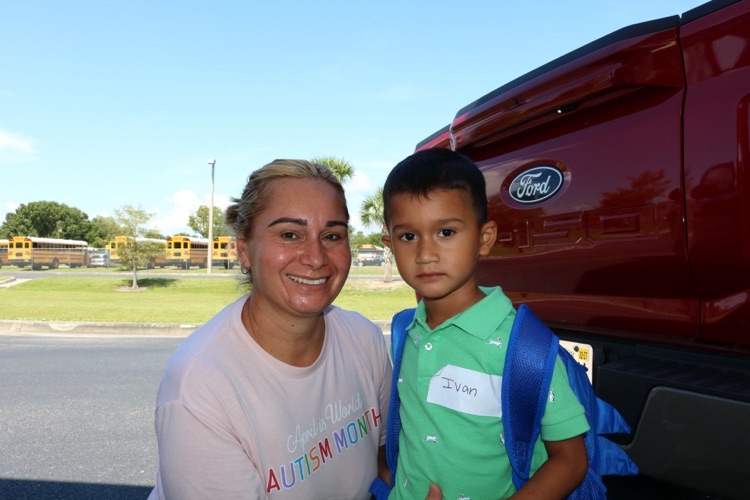 student and mom at drop off