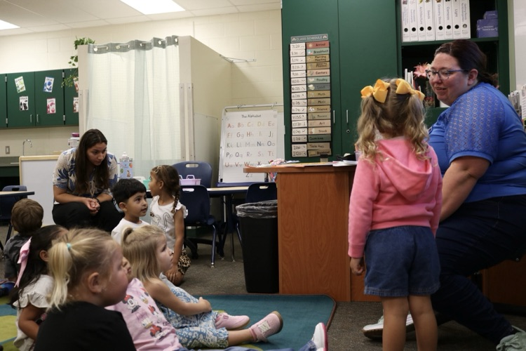 vpk classroom students sitting looking at teacher