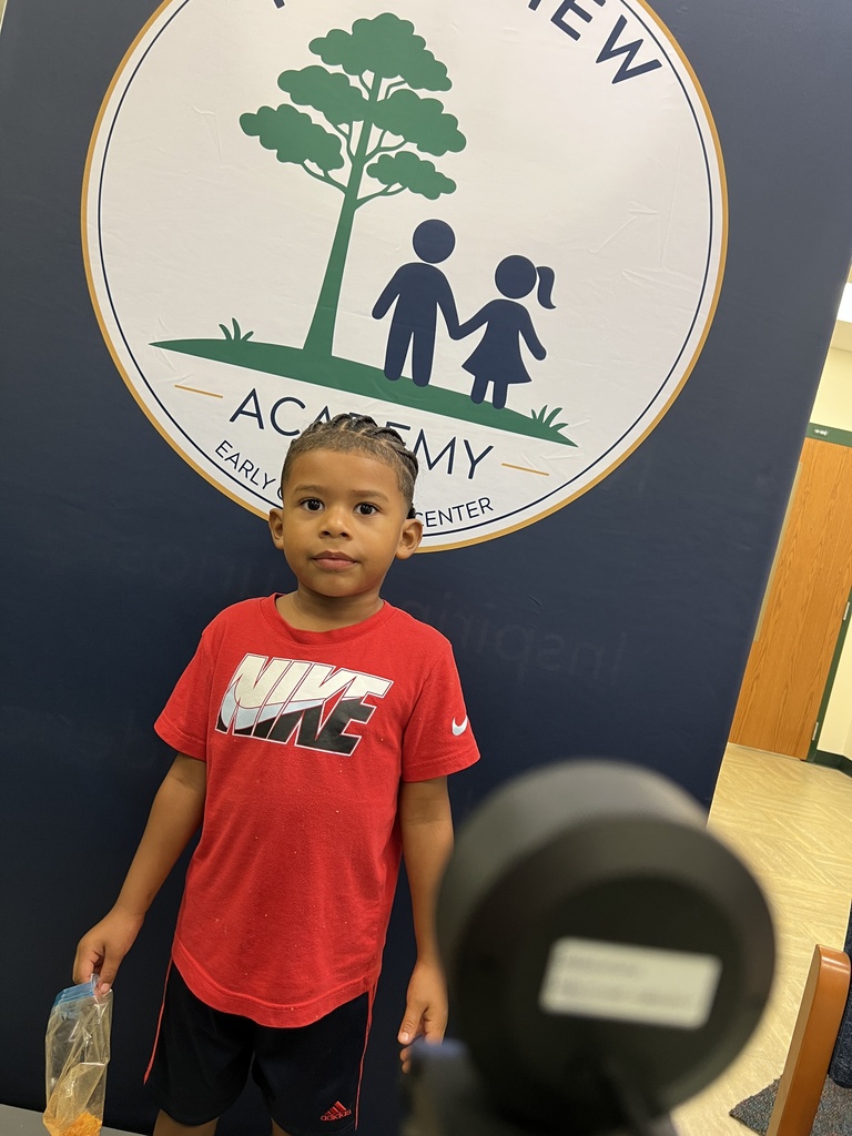 student ready for his student ID picture