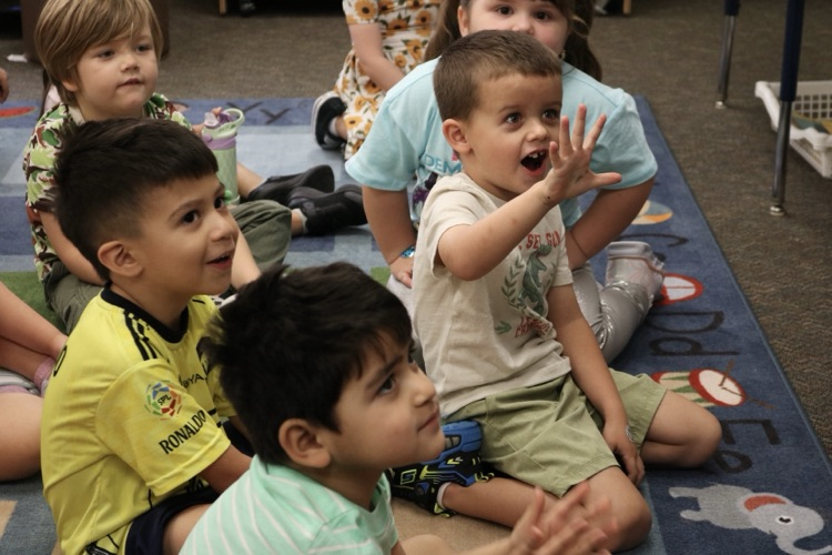 students raising their hand