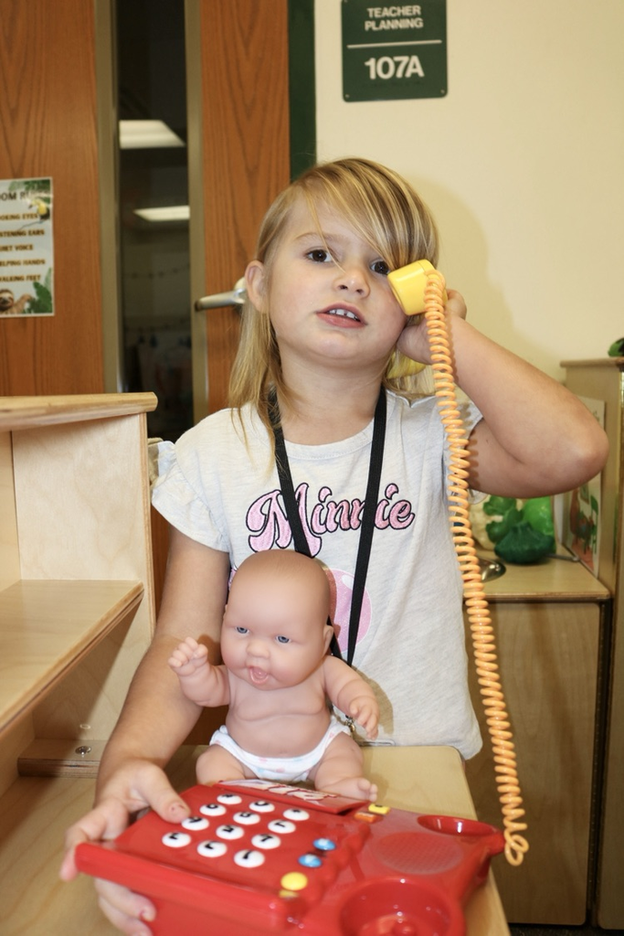 student playing on phone