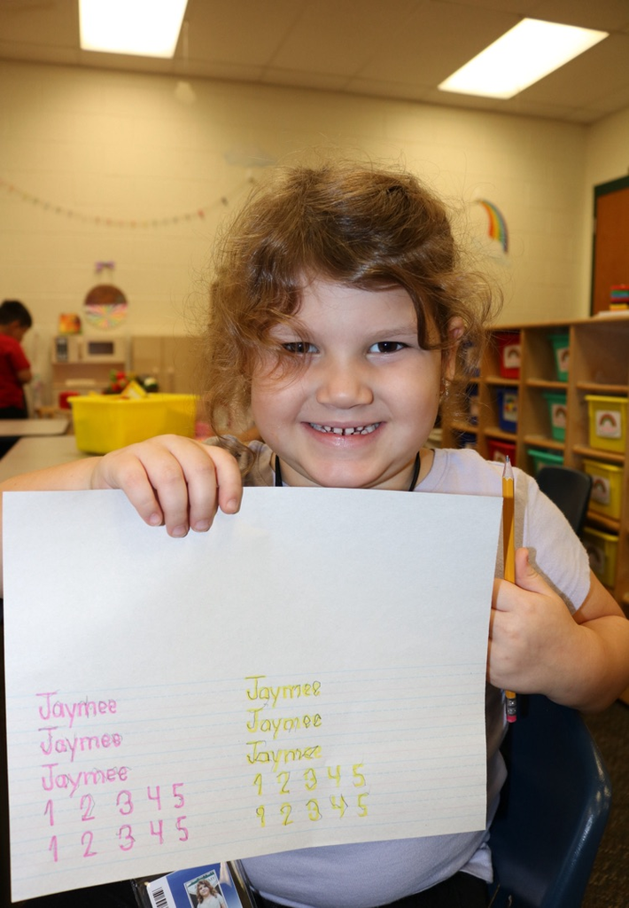 student showing handwriting practice
