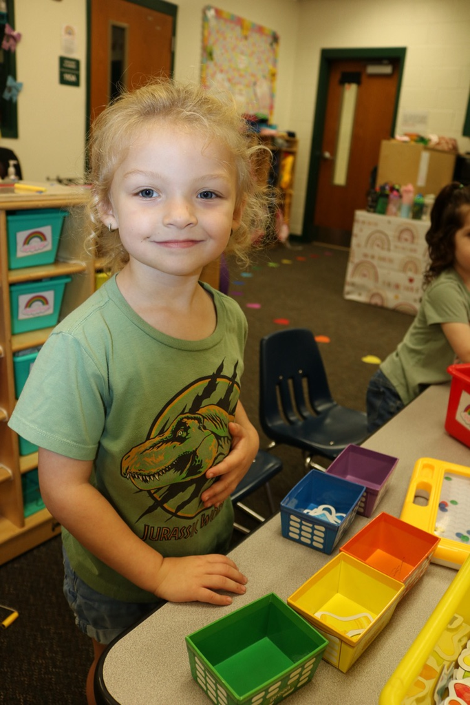 student playing in vpk class