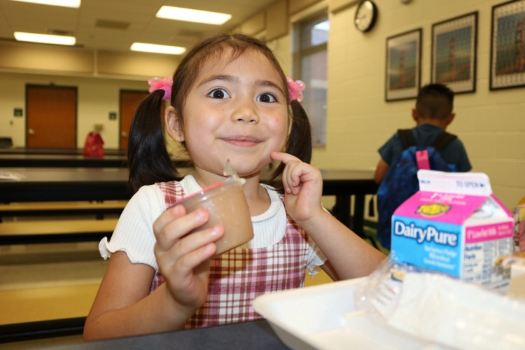 student at breakfast