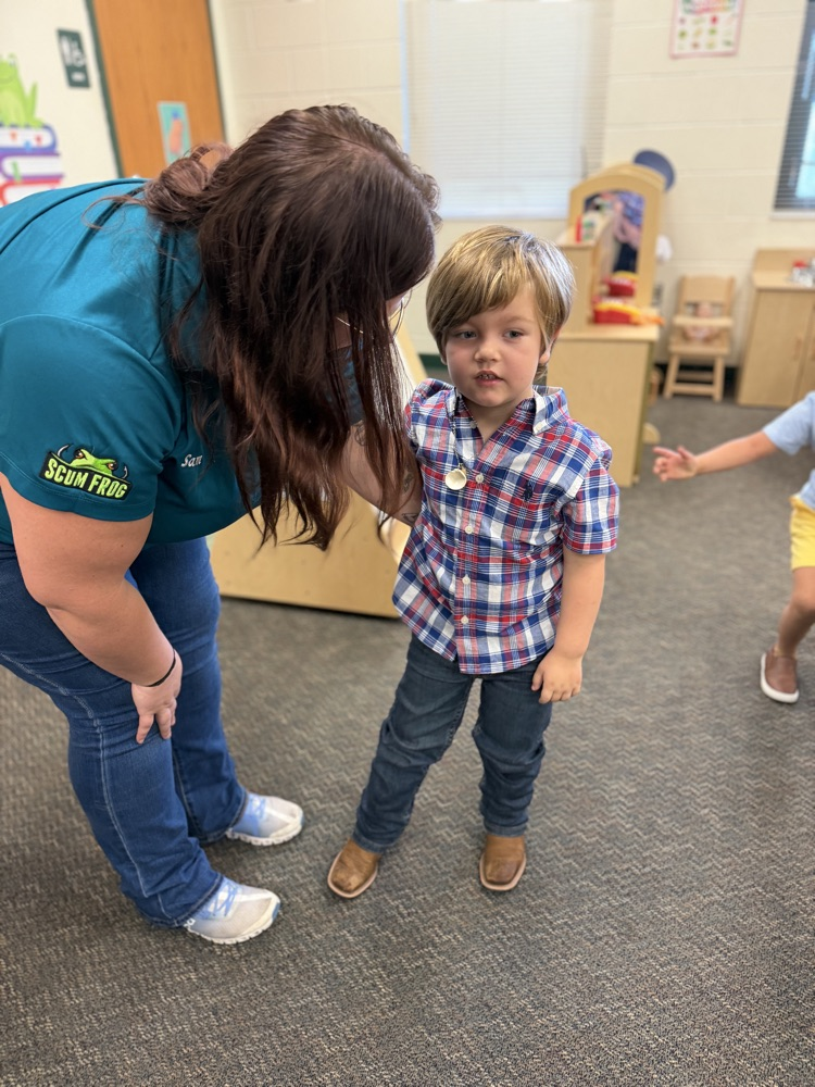 mom and student inside classroom