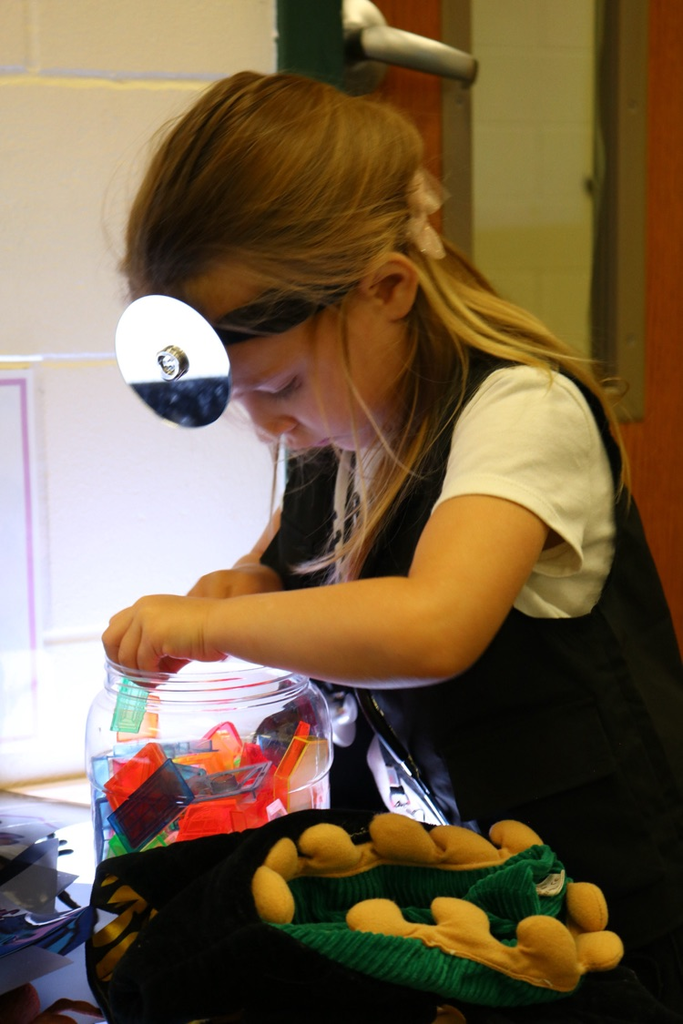 student playing In prek class