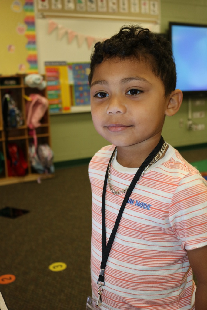 student smiling in prek class 