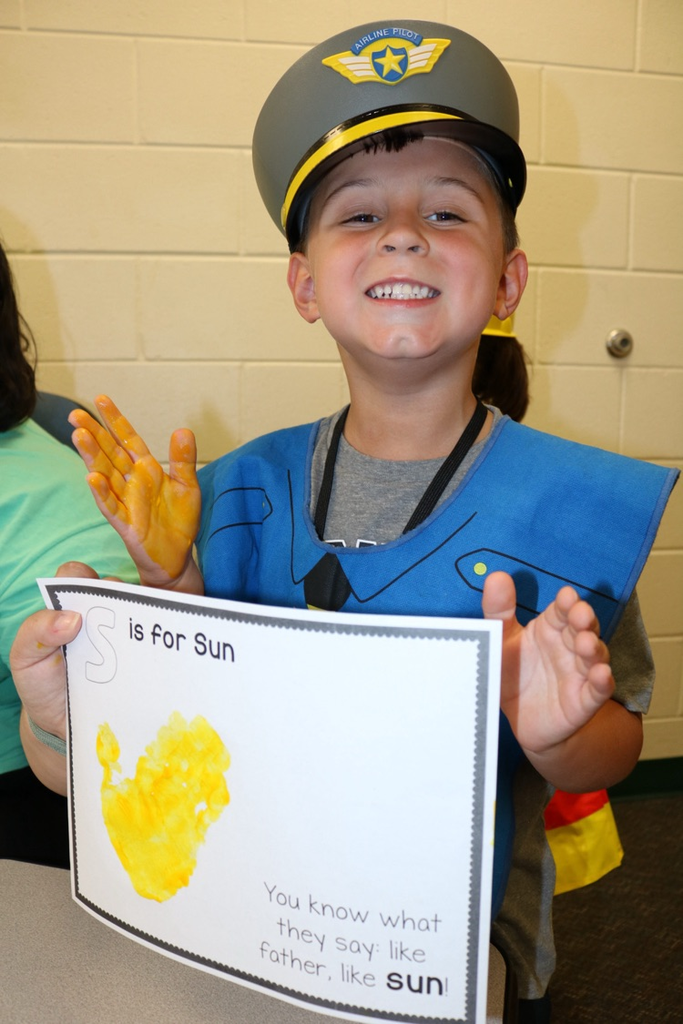 student showing hand art 