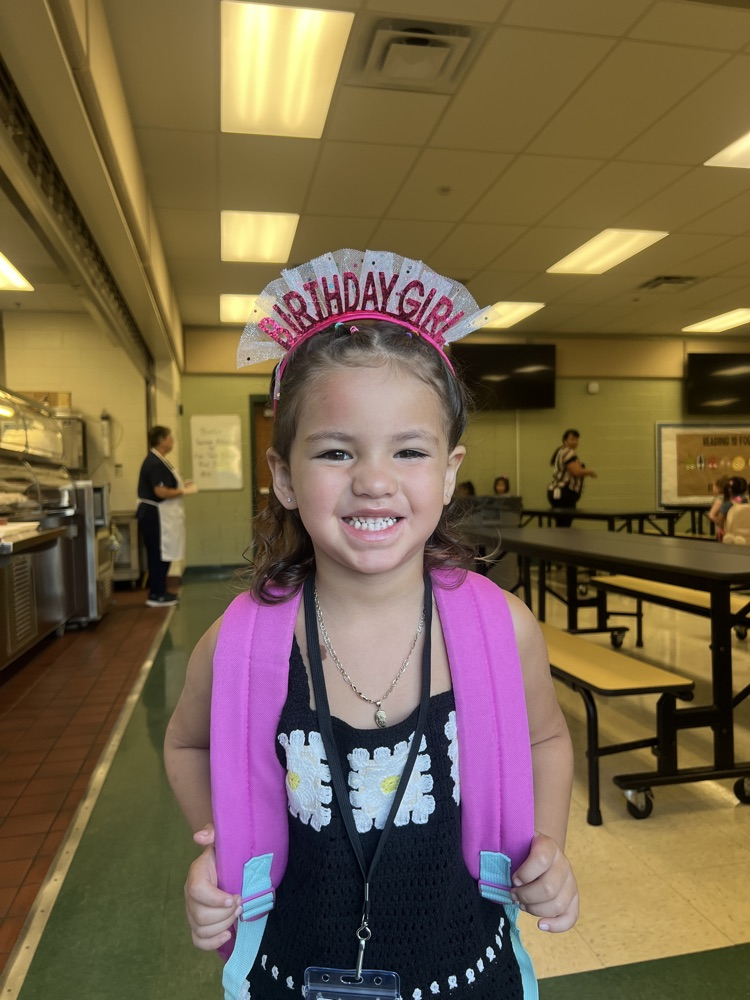 student with birthday headband