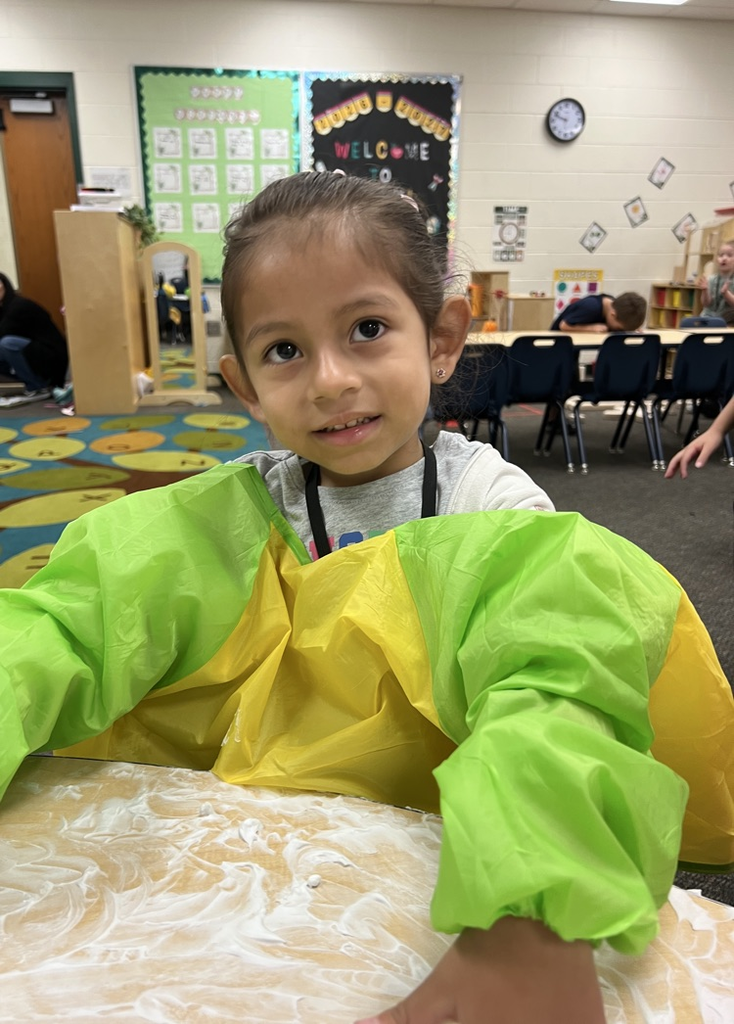 students playing with foam 