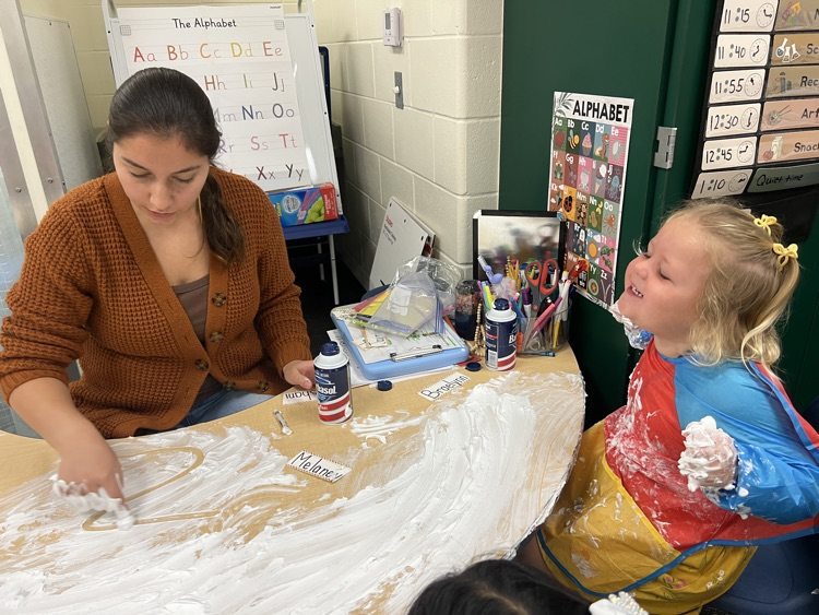 students playing with foam 