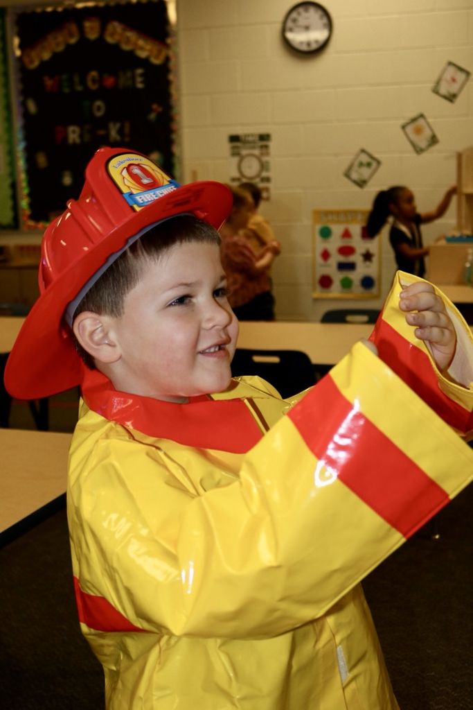 student in firefighter costume