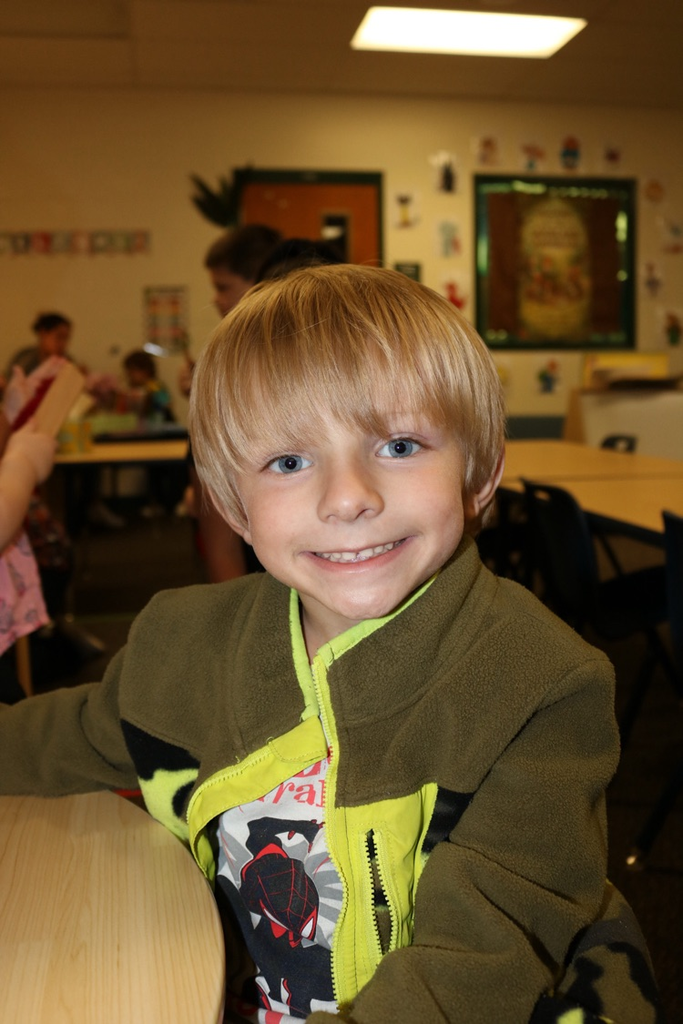 student smiling in class