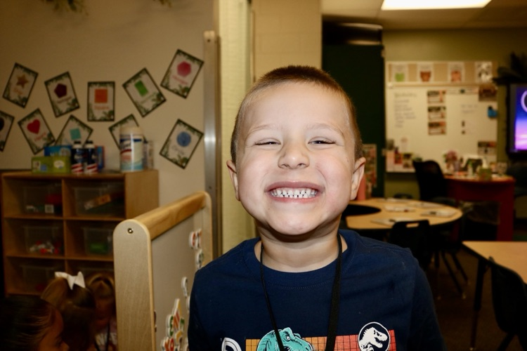 student smiling in class