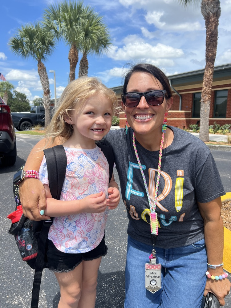 teacher and student at dismissal 
