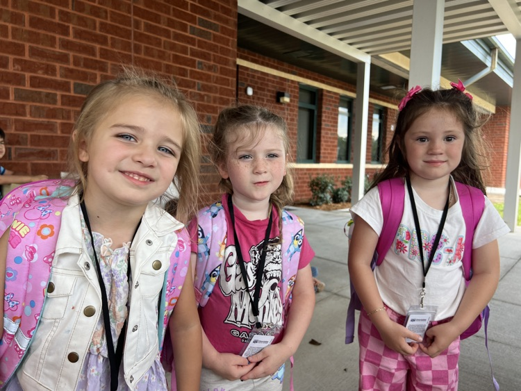 students waiting at parent pick up