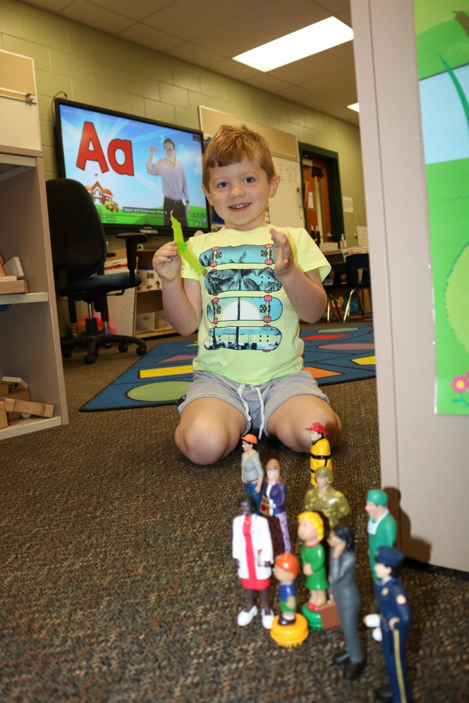 student playing with toys 