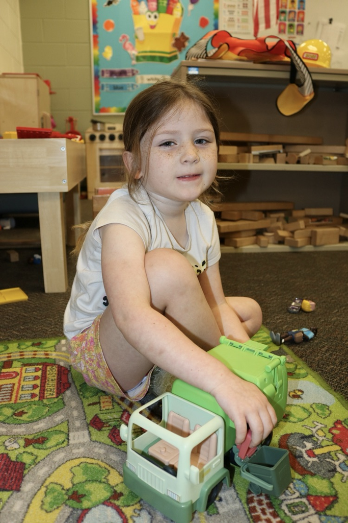 student playing with toys 