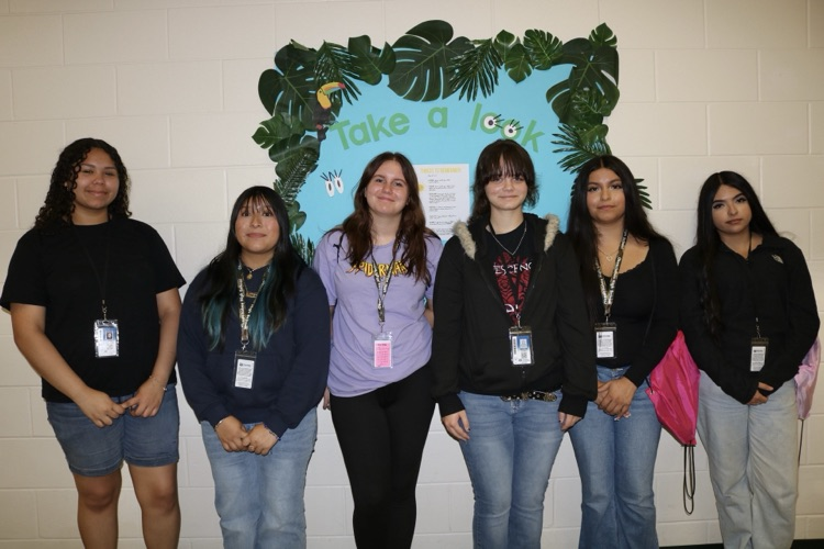 six high school girls visiting prek school