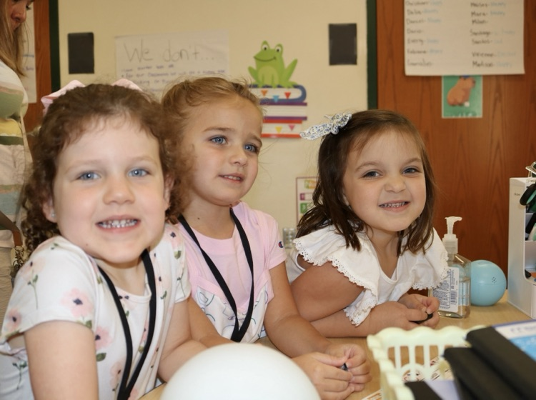 three prek girls smoking