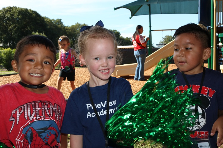 three students at recess 