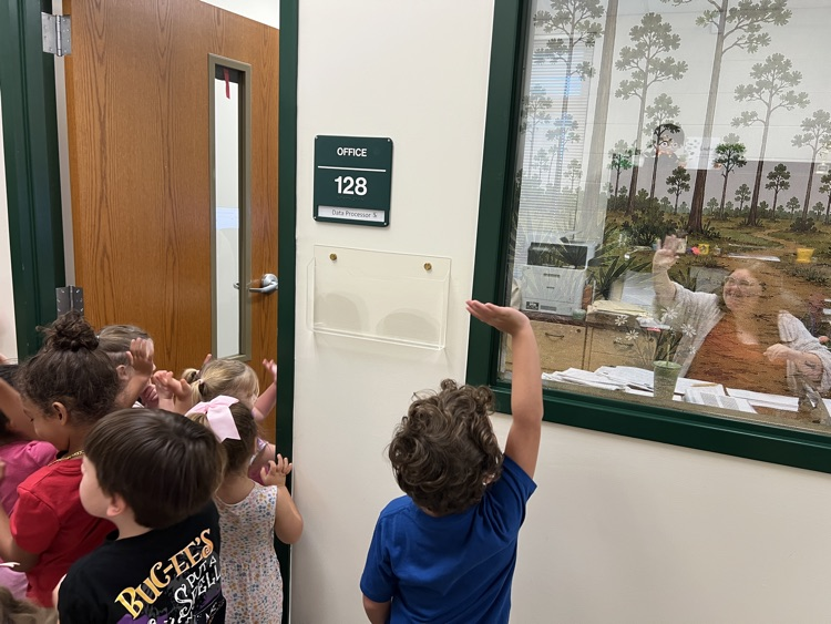 students taking a tour of the office