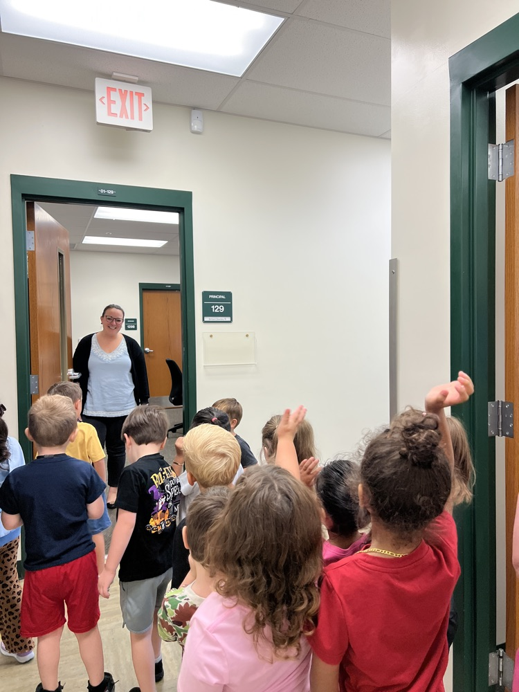 students taking a tour of the office