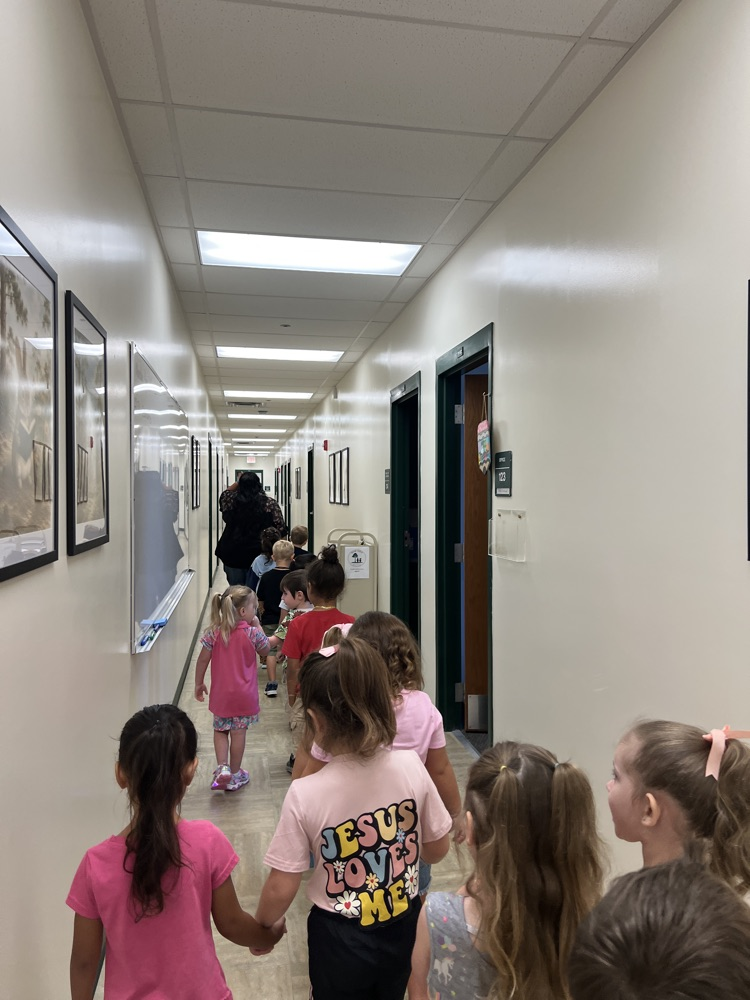 students taking a tour of the office