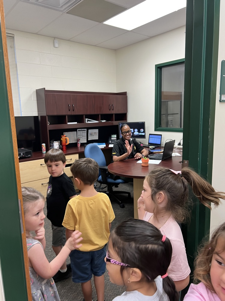students taking a tour of the office