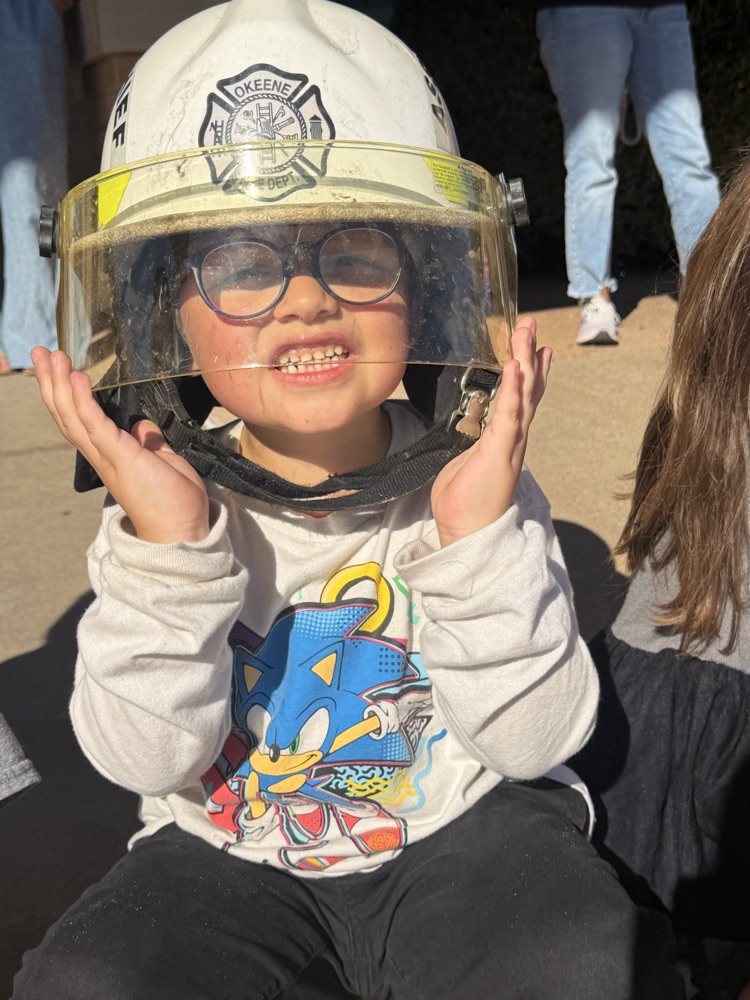 fire hat on kid