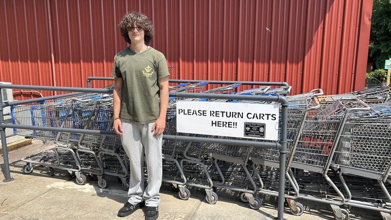 Daniel Gavrikov, a member of Boy Scout Troop 219 in Old Bridge, has completed a new shopping cart corral for the Food Bank as part of his Eagle Scout project.