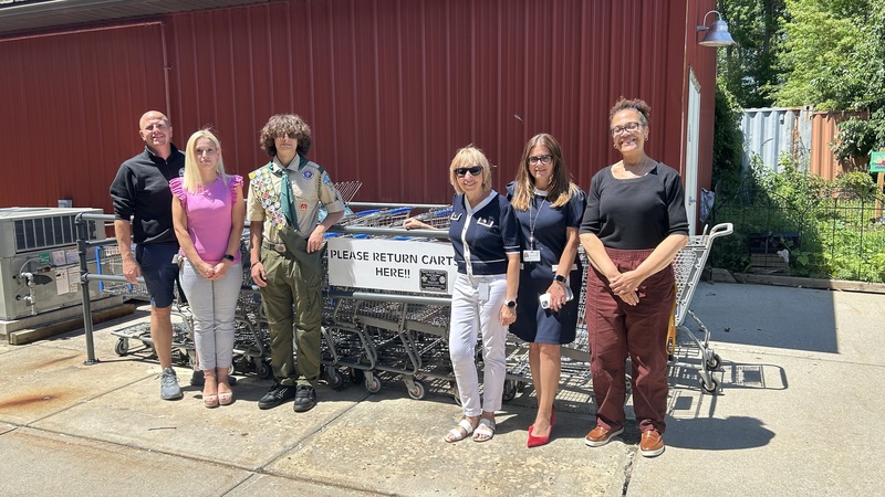 Daniel Gavrikov, a member of Boy Scout Troop 219 in Old Bridge, has completed a new shopping cart corral for the Food Bank as part of his Eagle Scout project.