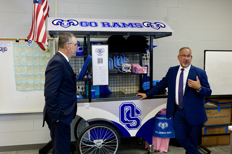 Dr Cardona with Ram Merch Cart