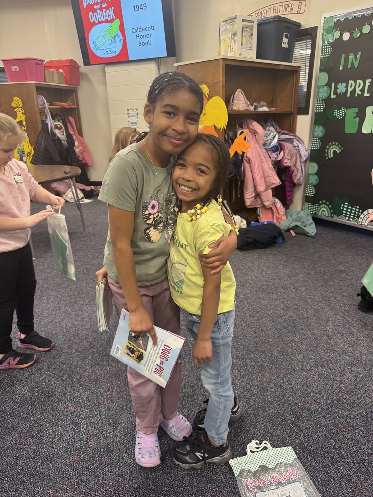 4th and 1st grade buddy reading to celebrate Read Across America Day!