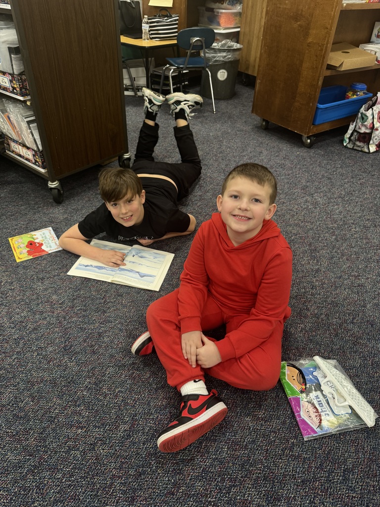 4th and 1st grade buddy reading to celebrate Read Across America Day!