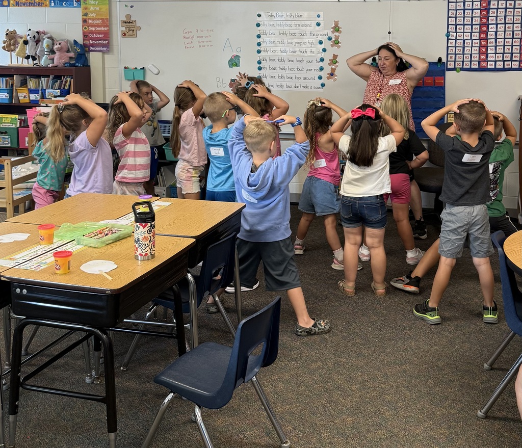 kindergarten students and teacher