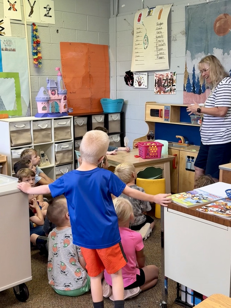 kindergarten students and teacher