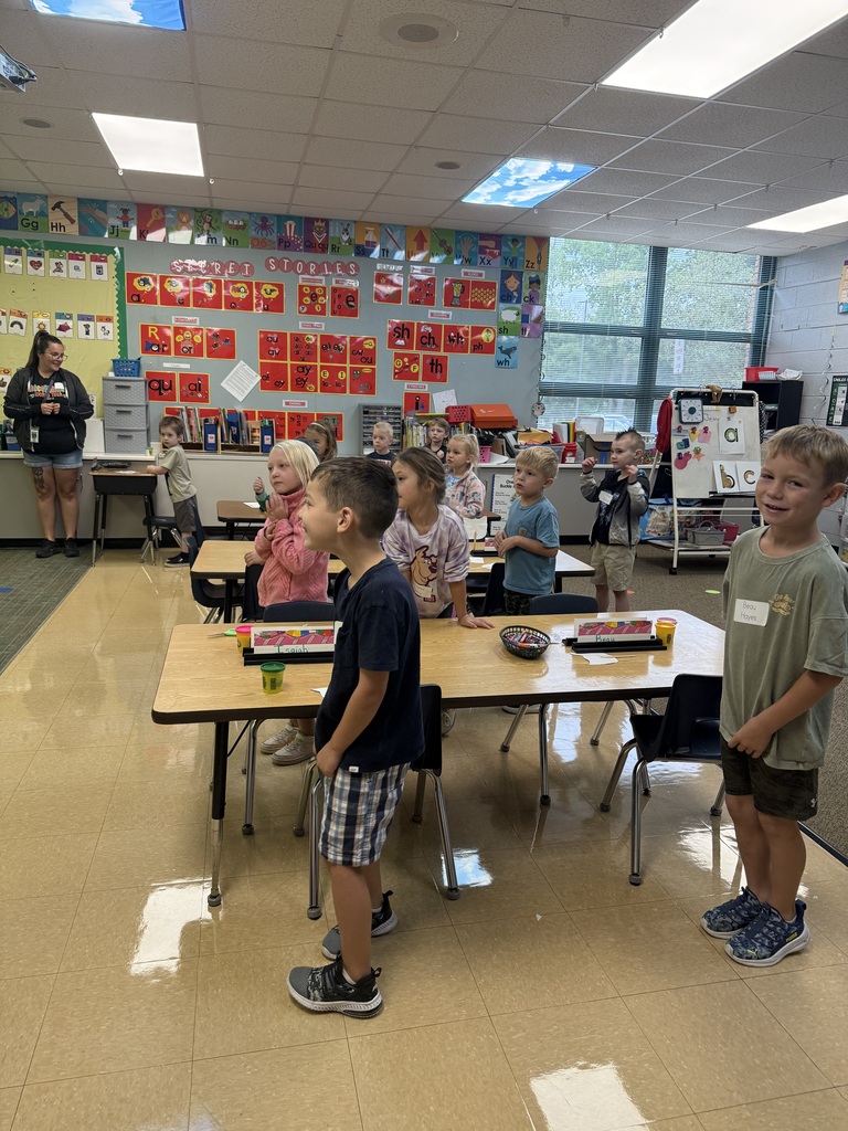 kindergarten students and teacher