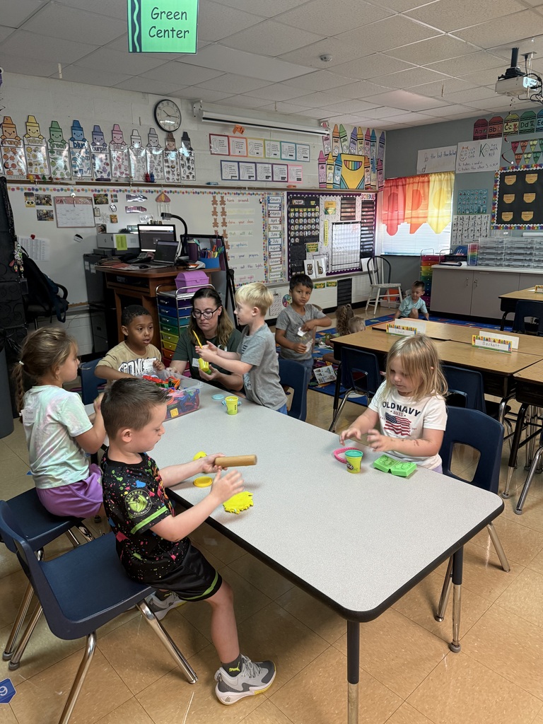 kindergarten students and teacher
